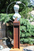 Circle of Life sculpture by metal sculptor craig brown, original welded metal sculpture and furniture